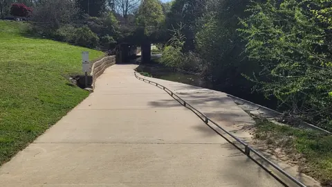 A paved stretch of the Little Sugar Creek Greenway in Charlotte